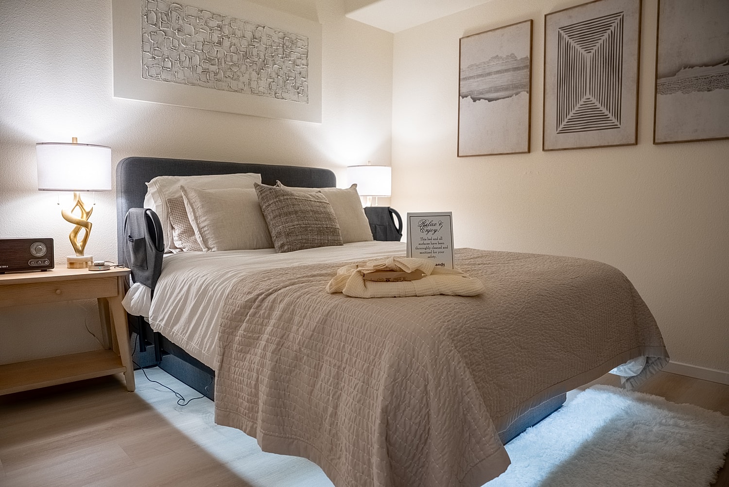 Cozy bedroom with soft lighting and decor.