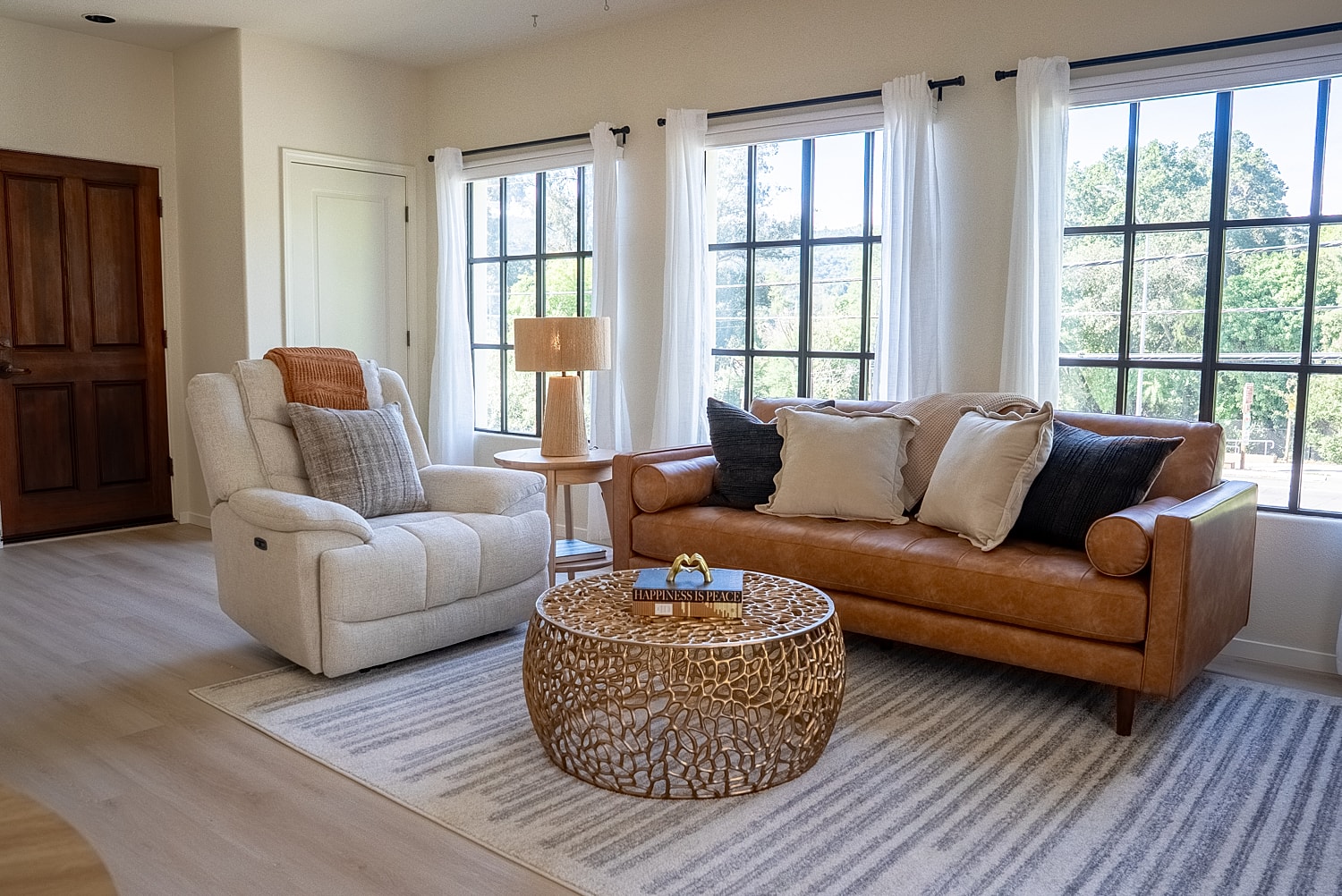 Cozy living room with stylish furniture and decor.