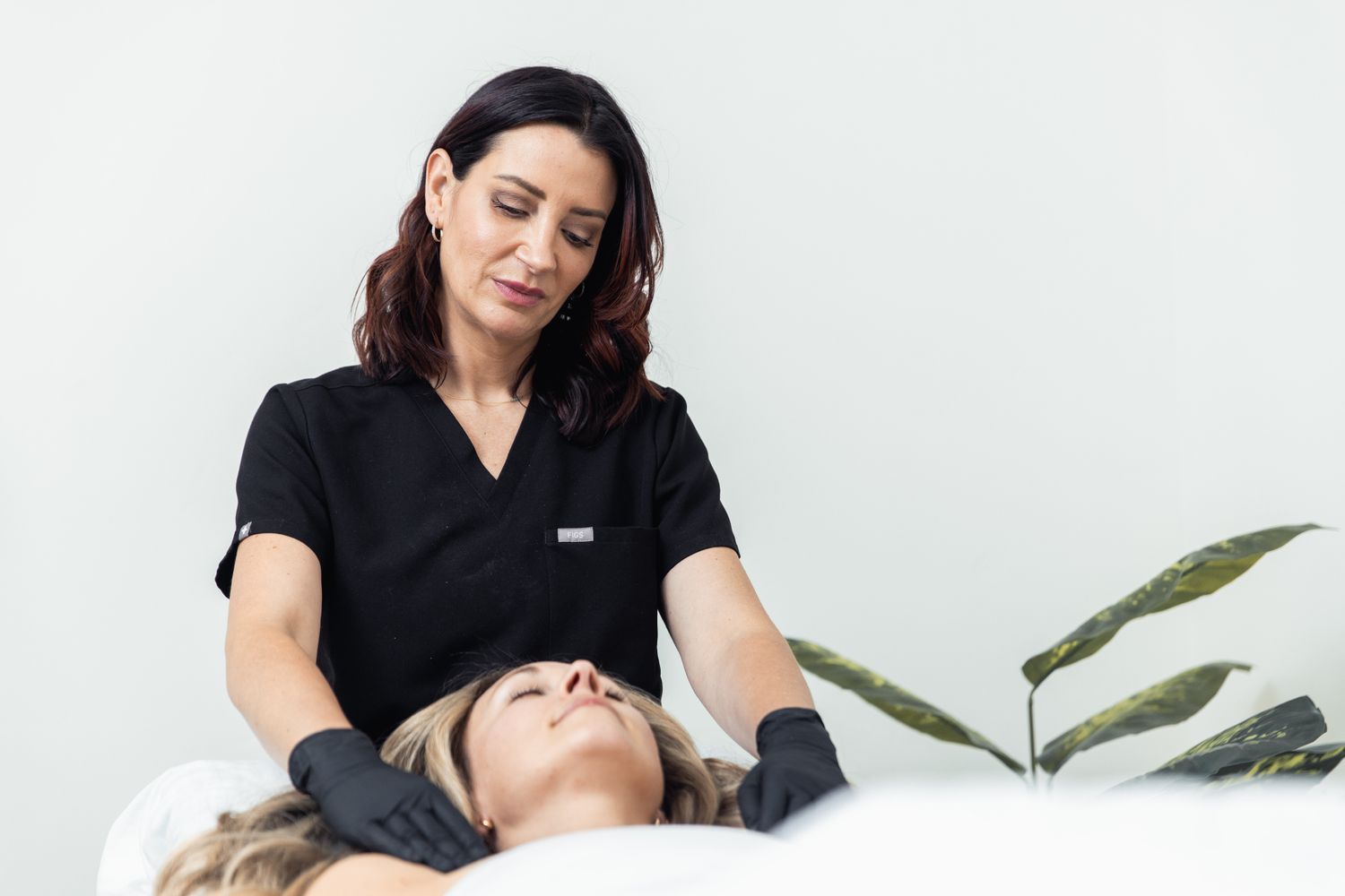 Facial treatment in a serene spa setting.
