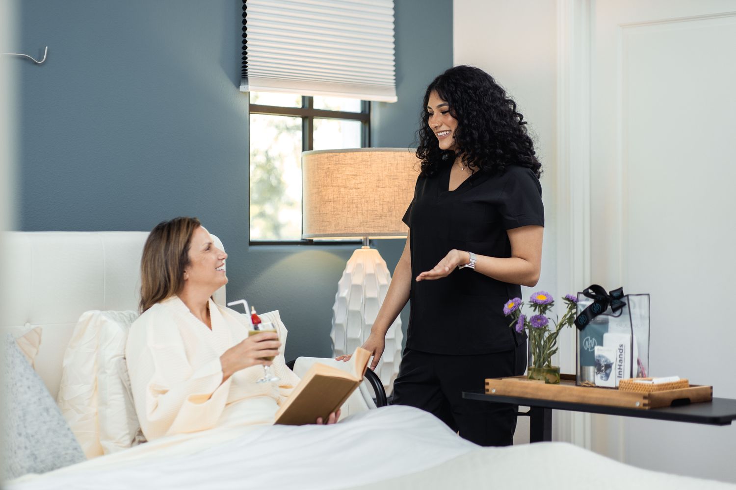 Confident woman in a green blazer, smiling.