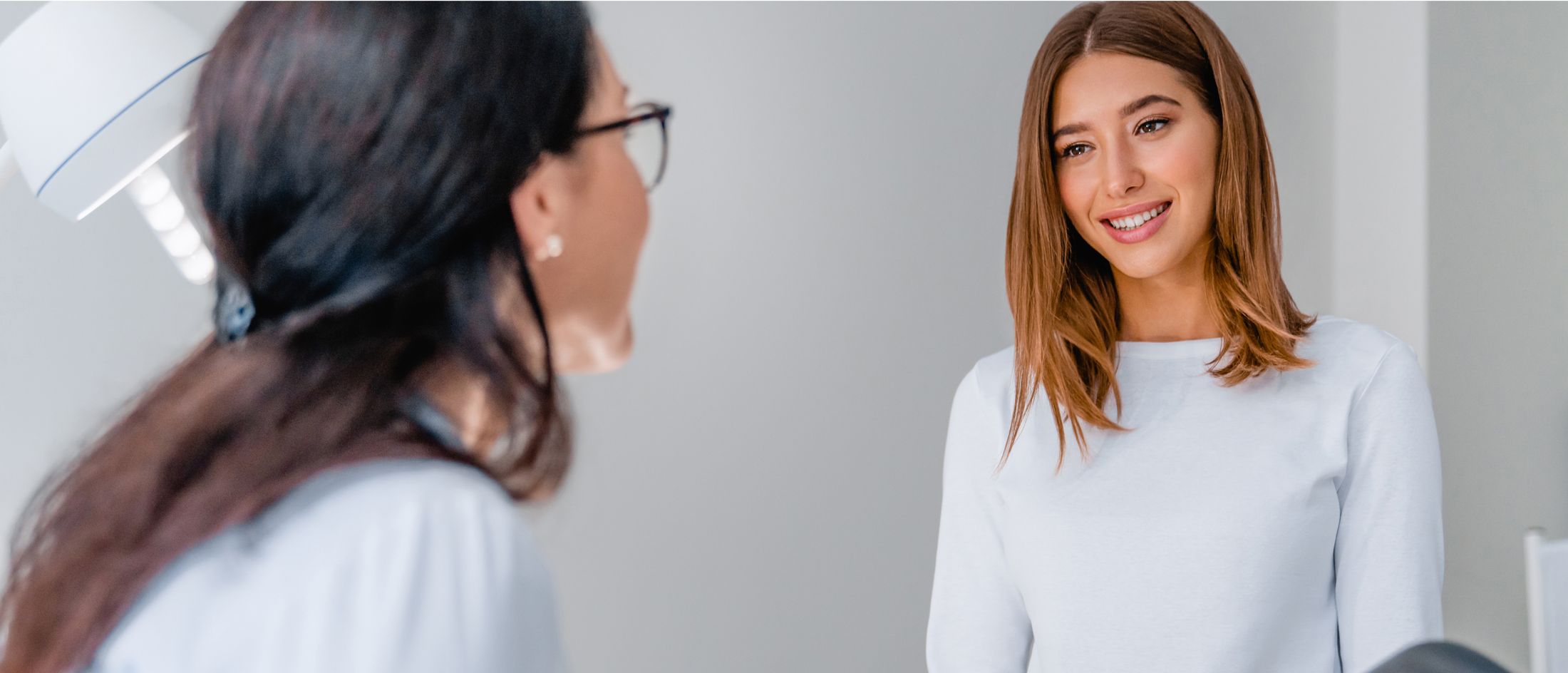 Patient and doctor in a consultation setting.