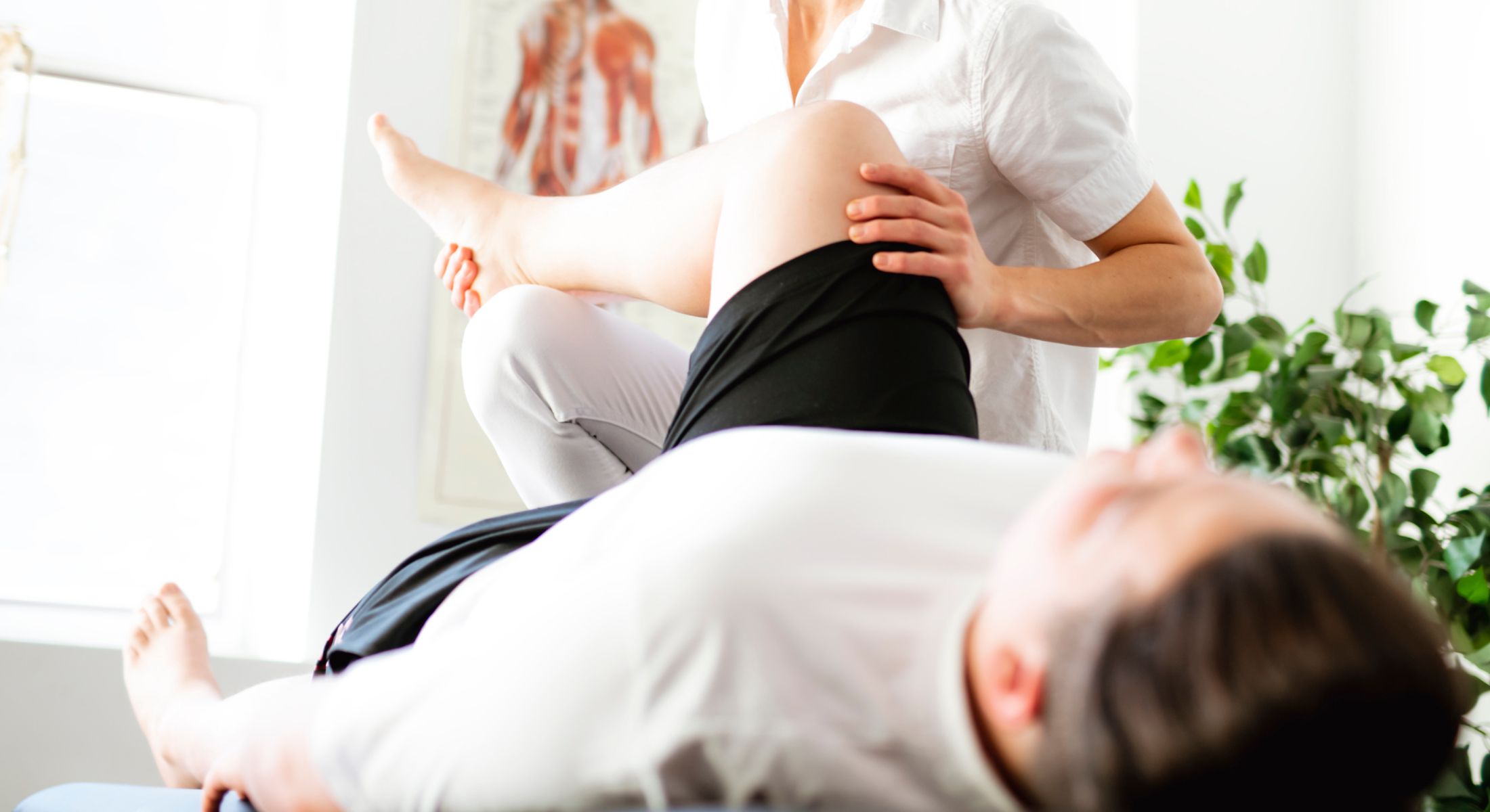 Physical therapy session focusing on leg movement.